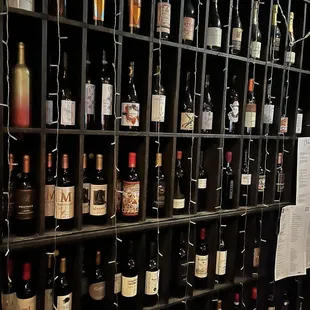 a wall of wine bottles