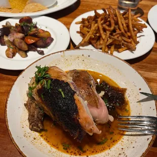 Mary&apos;s Organic smoked chicken with a side of vegetables and a side of fries