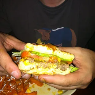 a man eating a sandwich