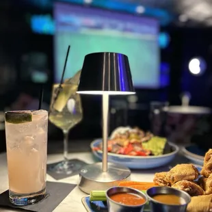 Paloma-loma, the Silent Spritz, jumbo chicken wings, the Chemist nachos