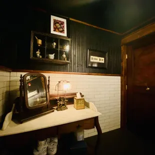 a bathroom with a sink and mirror