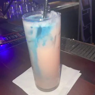vodka, pineapple, strawberry, banana liquor and Blue curaçao