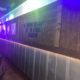 a bar with neon lights