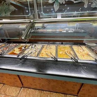 a buffet with many different types of food