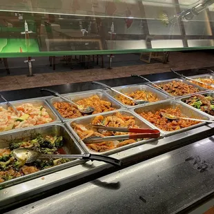 a buffet with many different types of food