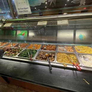 a buffet with many different types of food