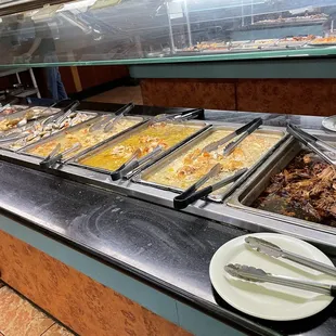 a buffet with a variety of food items