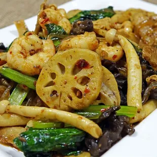 a plate of stir fried vegetables