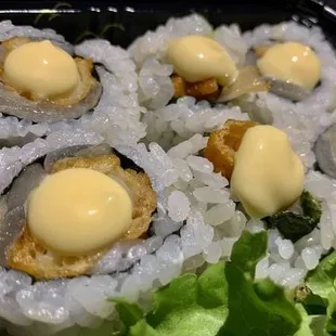 a close up of a sushi dish