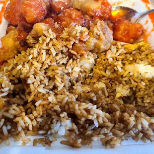 Sweet and sour chicken with what was supposed to be fried rice but they put white rice with soy sauce mixed in