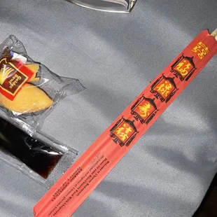 Complimentary soy sauce and fortune cookie