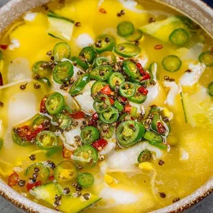 Fish filet in green pepper sauce