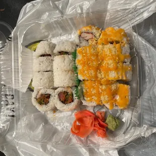 Spicy Tuna Roll ($6.25) + Crunch Roll ($5.45)