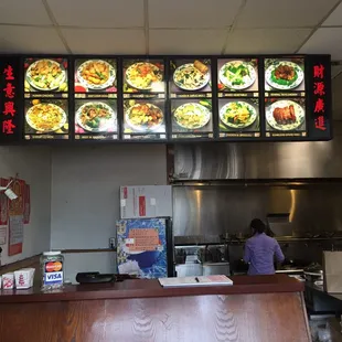 a restaurant counter and menus