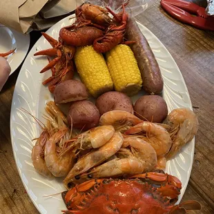 Crab, shrimp, crawfish, sausage, potatoes and corn. There was more but this is all that fit on the serving platter!