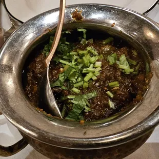 Hoppers Ghee Roast: Chicken roasted in home ground dry masala, crushed peppers, tamarind, yogurt, jaggery and clarified butter.