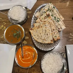 Lamb (Butter Masala) Makhani and Chicken Tikka Masala and Garlic Naan and Onion Kulcha Bread