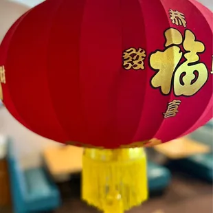 a red lantern hanging from the ceiling