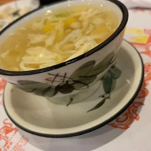 Egg drop soup in a pretty cup.