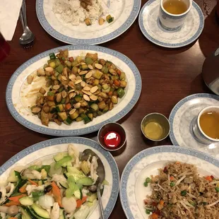 four plates of food on a table