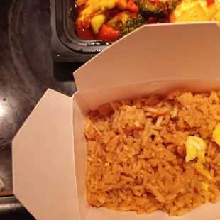 Plain fried rice that comes with every item ordered. Plenty for at least two.
