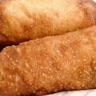 Large, golden fried egg rolls overstuffed with cabbage, pork &amp; veggies. Yum.