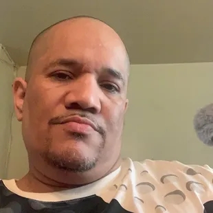 a man in a polka dot shirt