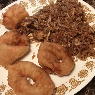 Fried shrimp dinner comes with egg roll and shrimp fried rice