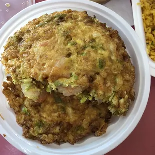 Shrimp egg foo young. Sorry I couldn&apos;t help myself. I took half of it already before taking a picture.