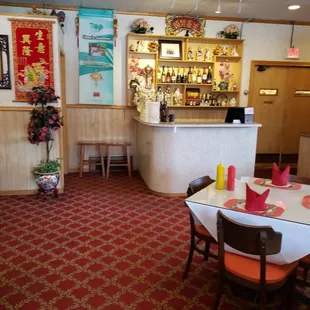 a dining room with a bar