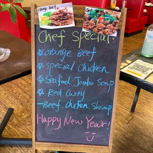 a menu on a chalk board