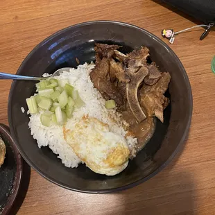 Pork and egg rice bowl. Really large bowl with plenty of food.