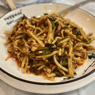a plate of stir fried noodles