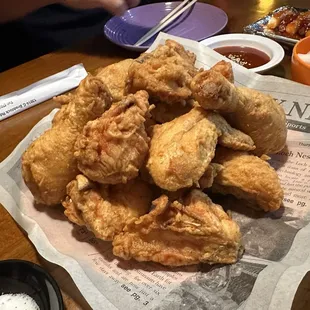 Fried chicken with hot &amp; spicy sauce on the side!