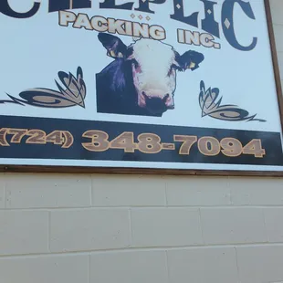 a sign on the side of a building