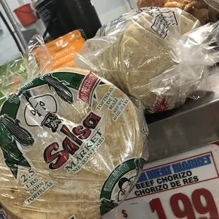 a person holding a tortilla