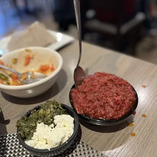 a table with bowls of food