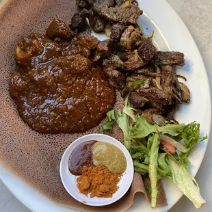 Left: Yebeg Wot (Lamb Stew) and Zil Zil Tibs (Beef)