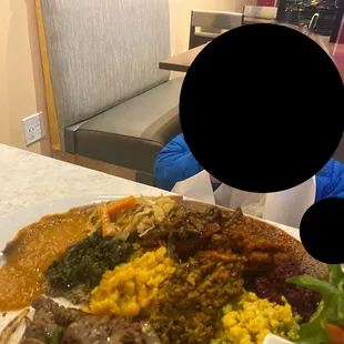 Veggie platter and beef tibs.