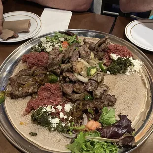 Kitfo and two different steak meals (forgot the names).