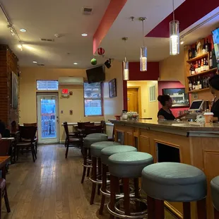 a woman sitting at the bar
