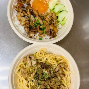 two bowls of noodles with meat and vegetables