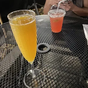 Mimosa and rum punch in the back