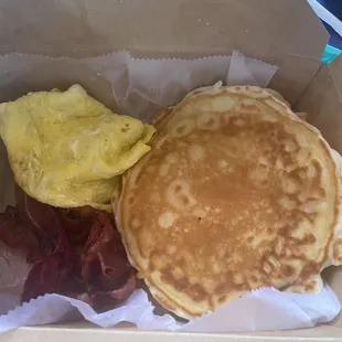 a breakfast of pancakes and bacon