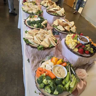 Sandwichs with sides of fruits and veggies