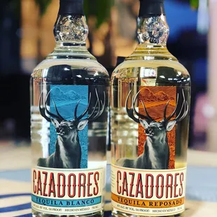 two bottles of cazadores tequila