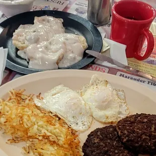 03/15/2023 two egg breakfast eggs over medium sausage patties hash browns no toast biscuits and gravy sausage gravy put on  cawfee