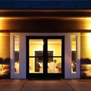 Front door of the Banquet Hall lit up and ready for a wedding reception.