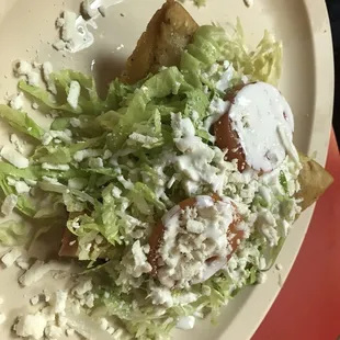 Beef empanada and a chicken flauta