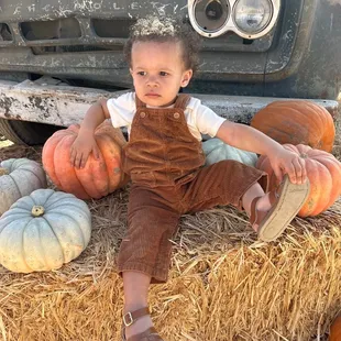 Over his mama taking photos